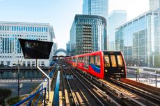 DLR train in Canary Wharf, London, UK.