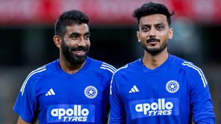 Jasprit Bumrah (L) and Axar Patel (R) of India seen in action during game four of the T20 International Series between Australia and India at People First Stadium.