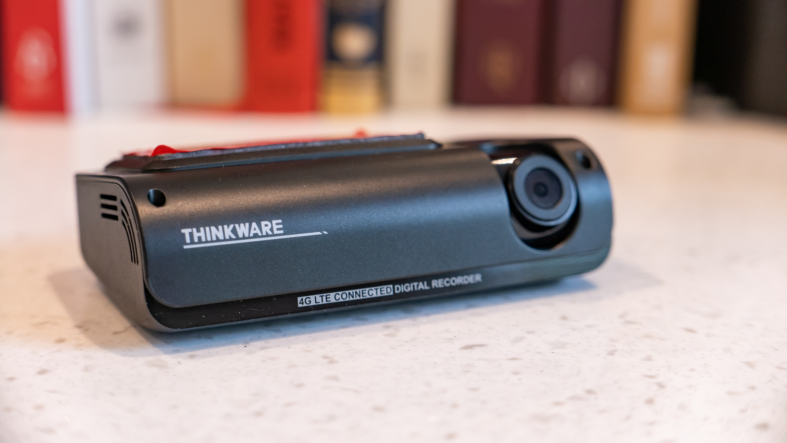 The Thinkware T700 dash cam sitting on a kitchen table