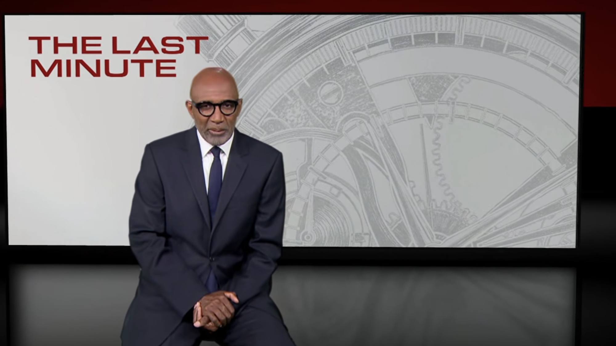 Sir Trevor Phillips prepares to deliver the Last Minute segment on 60 Minutes.