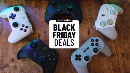 A collection of controllers from 2025 scattered around a desktop, with a Black Friday deals stamp in the middle of them