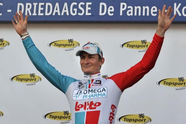 Andr&eacute; Greipel (Omega Pharma-Lotto) on the podium after winning stage one of Three Days of De Panne.