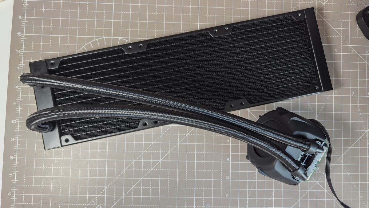 A Noctua NL-LC1 liquid cooler being installed on a test bench for testing.