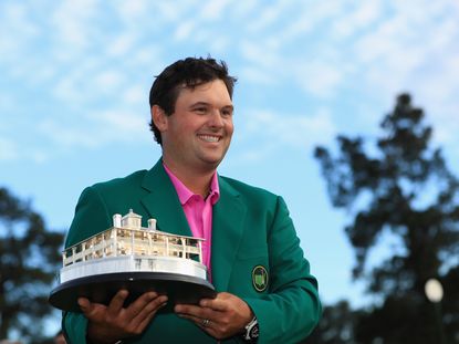Reed holds off Fowler and Spieth to win US Masters