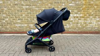 a child sleeping in Bugaboo Butterfly 2