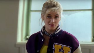 Kristy Swanson wears a questioning look and a letter jacket in Buffy the Vampire Slayer.