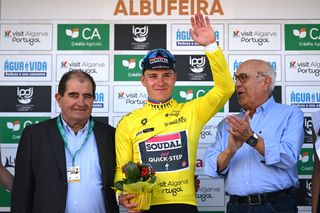 ALBUFEIRA PORTUGAL FEBRUARY 17 Remco Evenepoel of Belgium and Team Soudal Quick Step celebrates at podium as Yellow Leader Jersey winner during the 50th Volta ao Algarve em Bicicleta 2024 Stage 4 a 22km individual time trial in Albufeira on February 17 2024 in Albufeira Portugal Photo by Dario BelingheriGetty Images