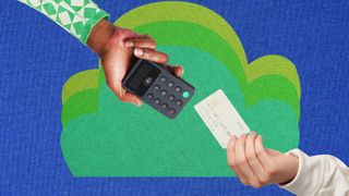 Hands making card payment with card reader