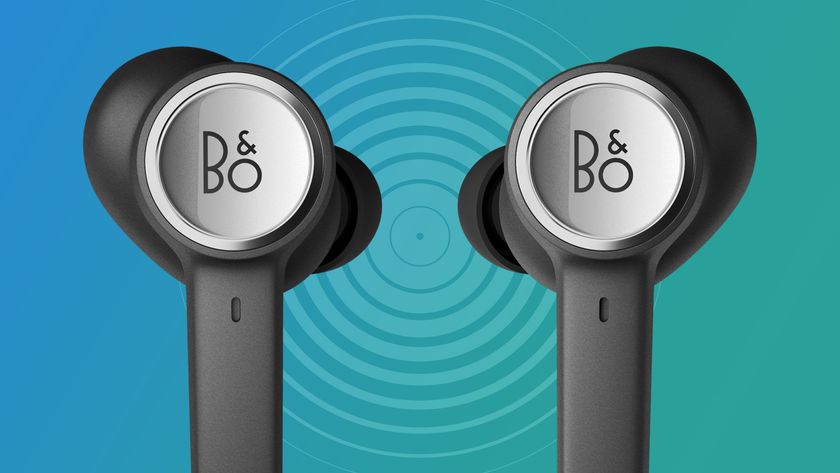 The B&amp;O Beoplay Eleven earphones on blue and green background