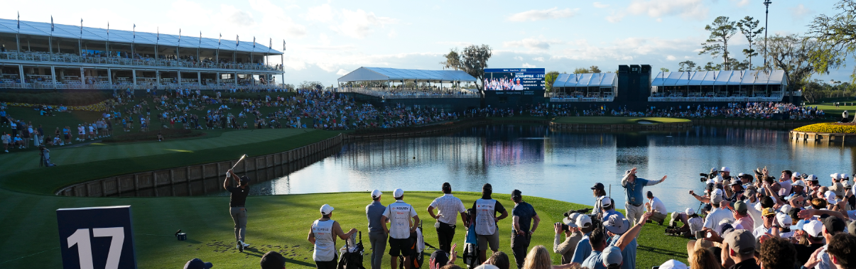 Xander Schauffele hits his tee shot on the 17th at TPC Sawgrass