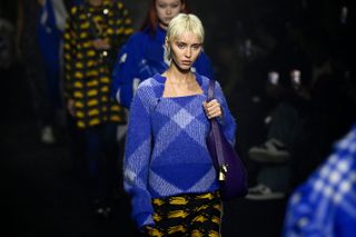 Iris Law walks the runway at the Burberry show during London Fashion Week February 2023 on February 20, 2023 in London, England.