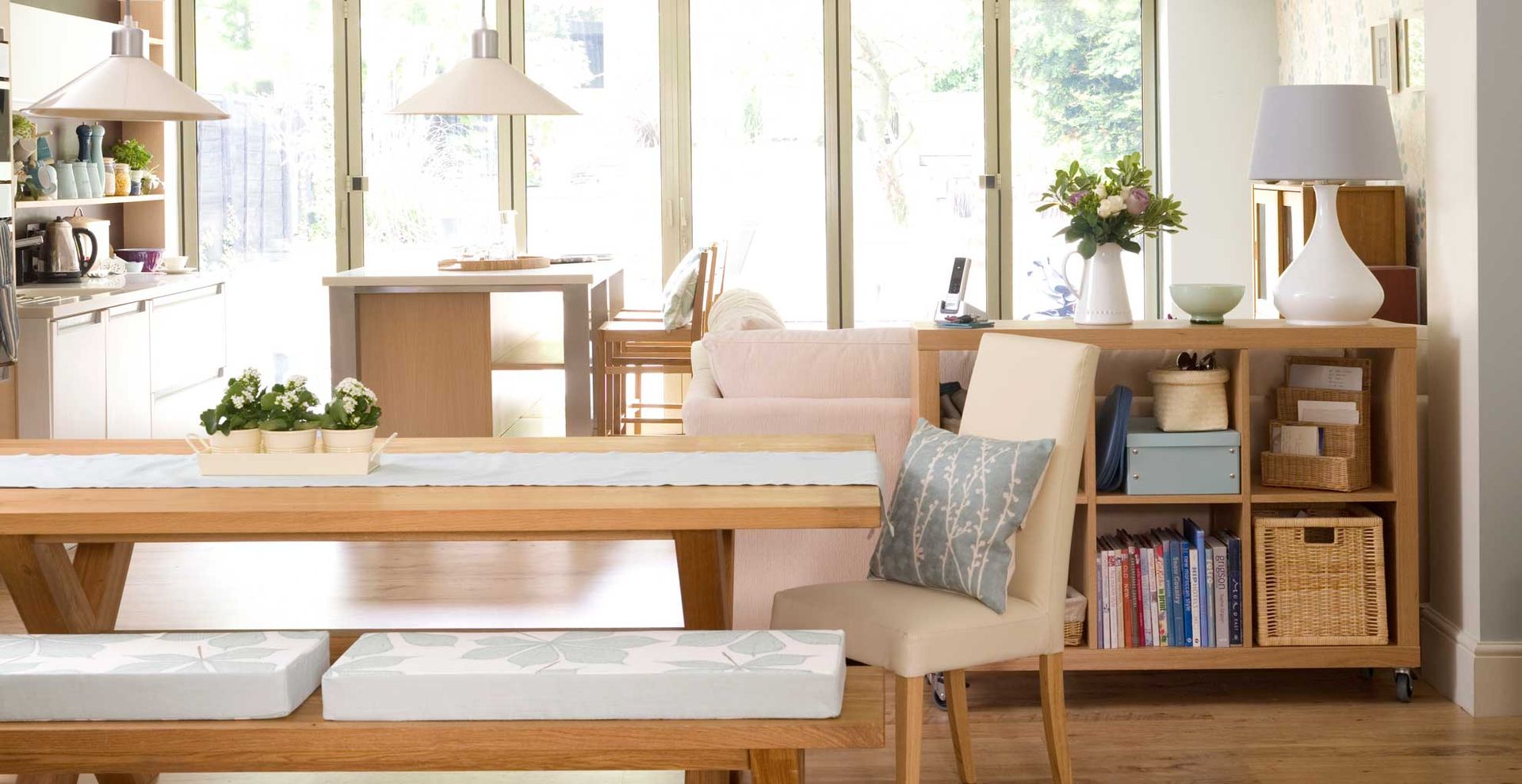 open-plan living and kitchen with storage units to show how to implement home organization ideas