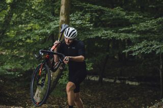 Image shows a person riding cyclocross.