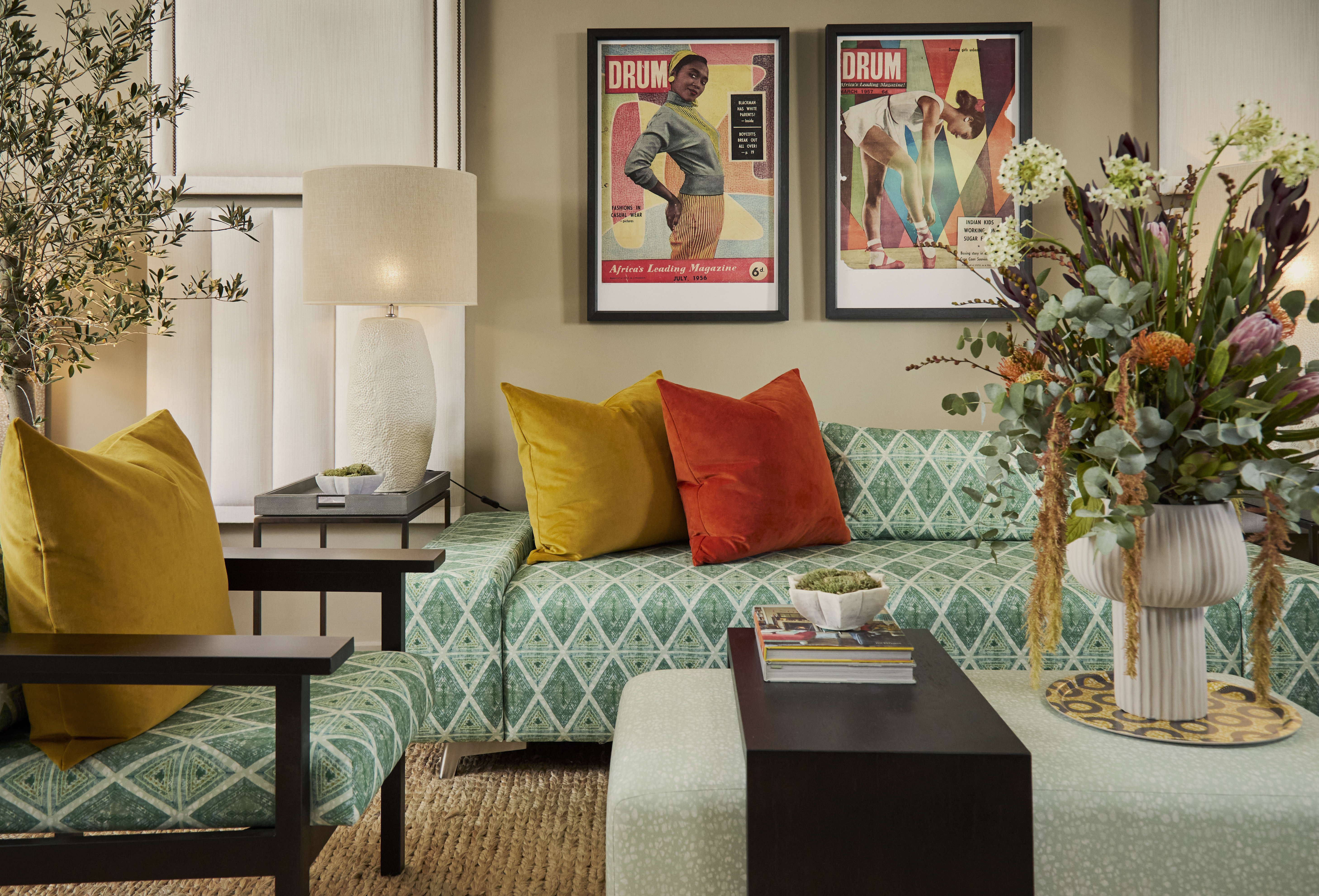 Neutral living room with west-african inspired patterned sofas