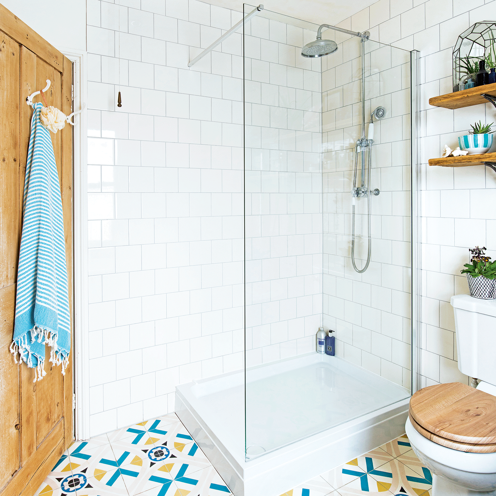White walk in shower with subway tiles