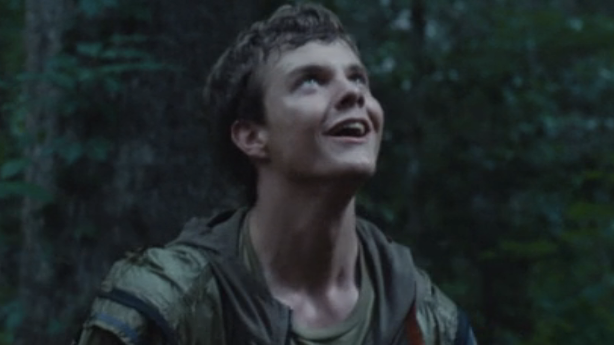 Jack Quaid as Marvel looking up in The Hunger Games