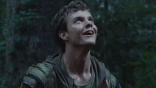 Jack Quaid as Marvel looking up in The Hunger Games