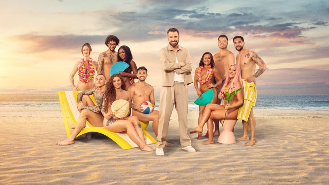 The mostly starkers cast of Dating Naked UK alongside smartly-dressed host Rylan in a promo shot for Dating Naked UK Season 2.