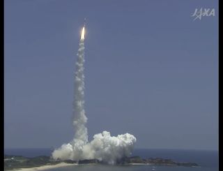 The H-2A rocket lifts off from the Tanegashima Space Center.