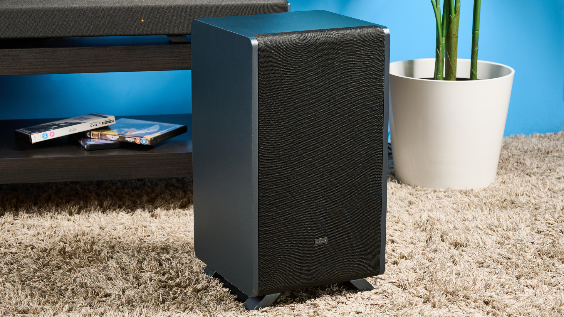The Sharp 5.1.2 HT-SBW55121 Soundbar photographed in front of a blue background.