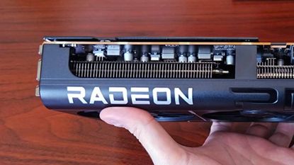 Close up of Radeon logo on RX 9070 GPU.