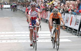 Joaquin Rodriguez (Katusha) edges Sammy Sanchez (Euskaltel-Euskadi) to win the opening stage.