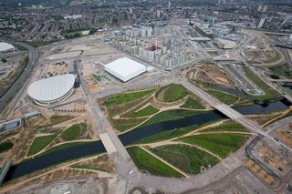 London 2012 Aquatics Centre by Zaha Hadid: View over the Olympic Park looking east, showing the parklands alongside the River Lee