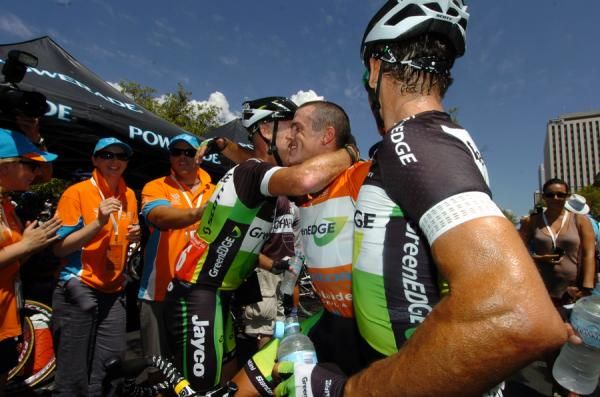 Gerrans embraced by his GreenEdge teammates at the finish.