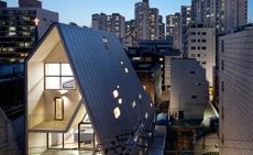  The two-storey home sits on top of the whole four-storey building, designed by The_System Lab to be financially self-sustaining