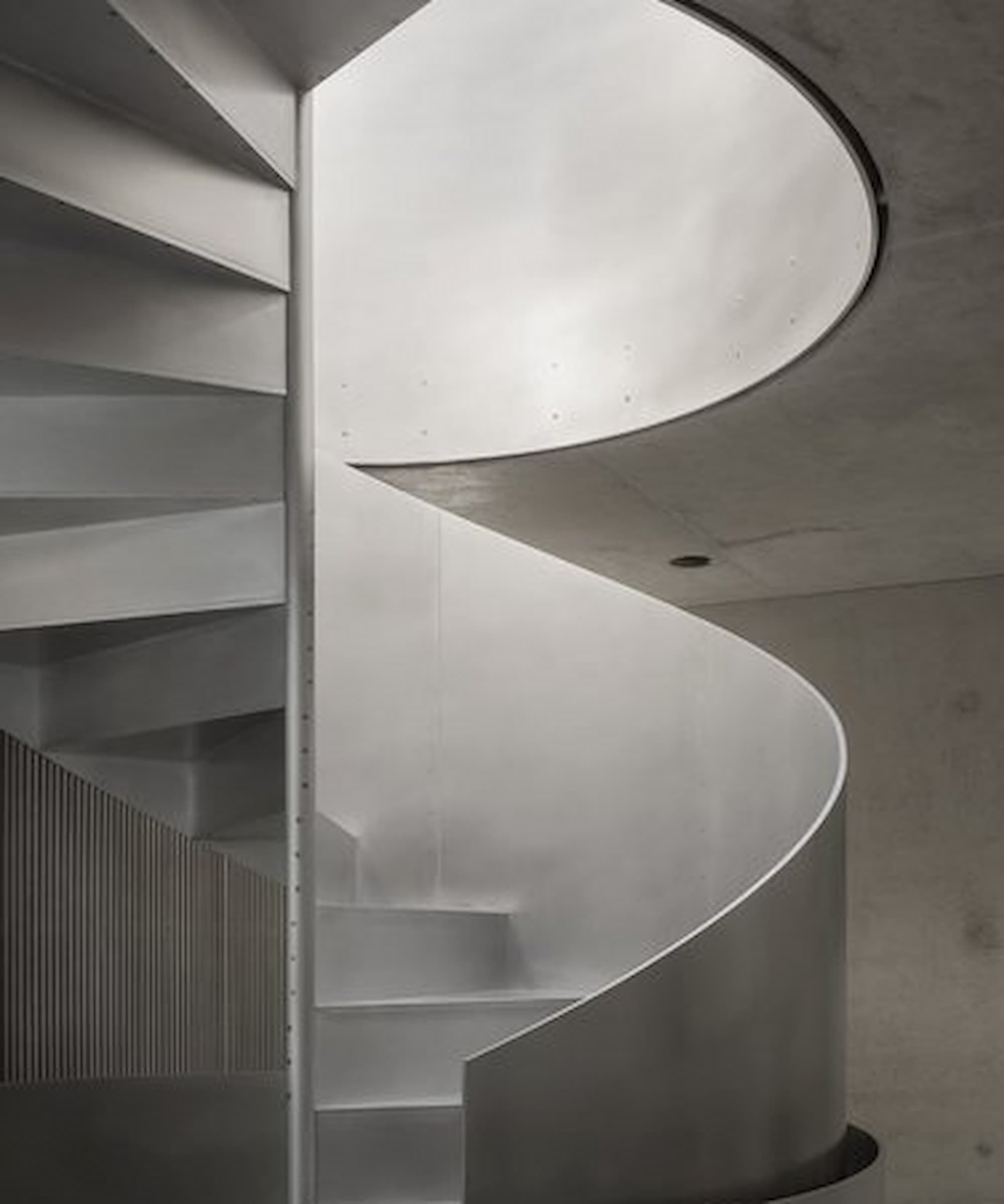 A curved metal staircase