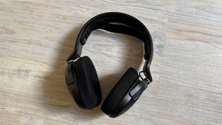 Corsair HS35 v3 headset mid shot showing entire headset with no mic attached against a white hardwood floor