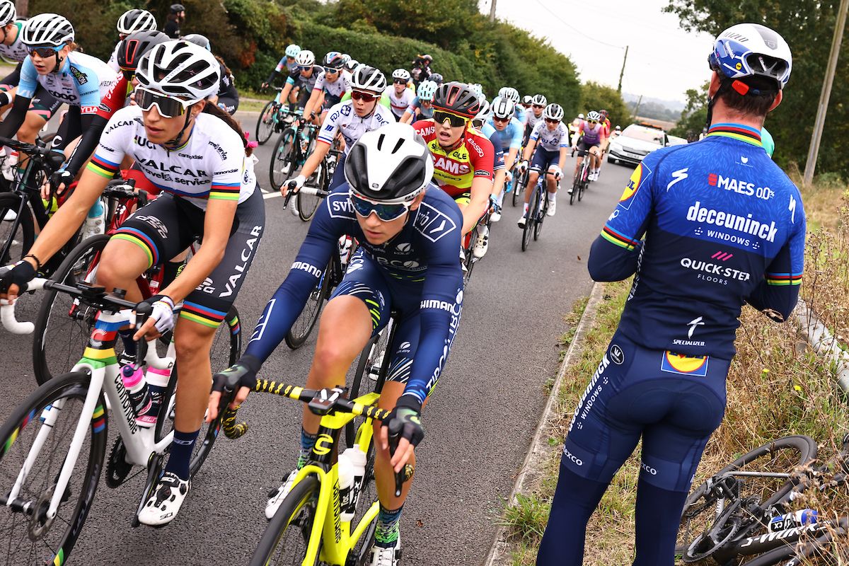 Picture by Alex Whitehead/SWpix.com - 07/10/2021 - Cycling - AJ Bell Women's Tour of Britain - Stage Four: Shoeburyness to Clacton-on-Sea, England - Elisa Balsamo of Team Valcar Travel &amp; Service and a Team TIBCO Silicon Valley Bank rider with mens pro rider Mark Cavendish spectating on the road side