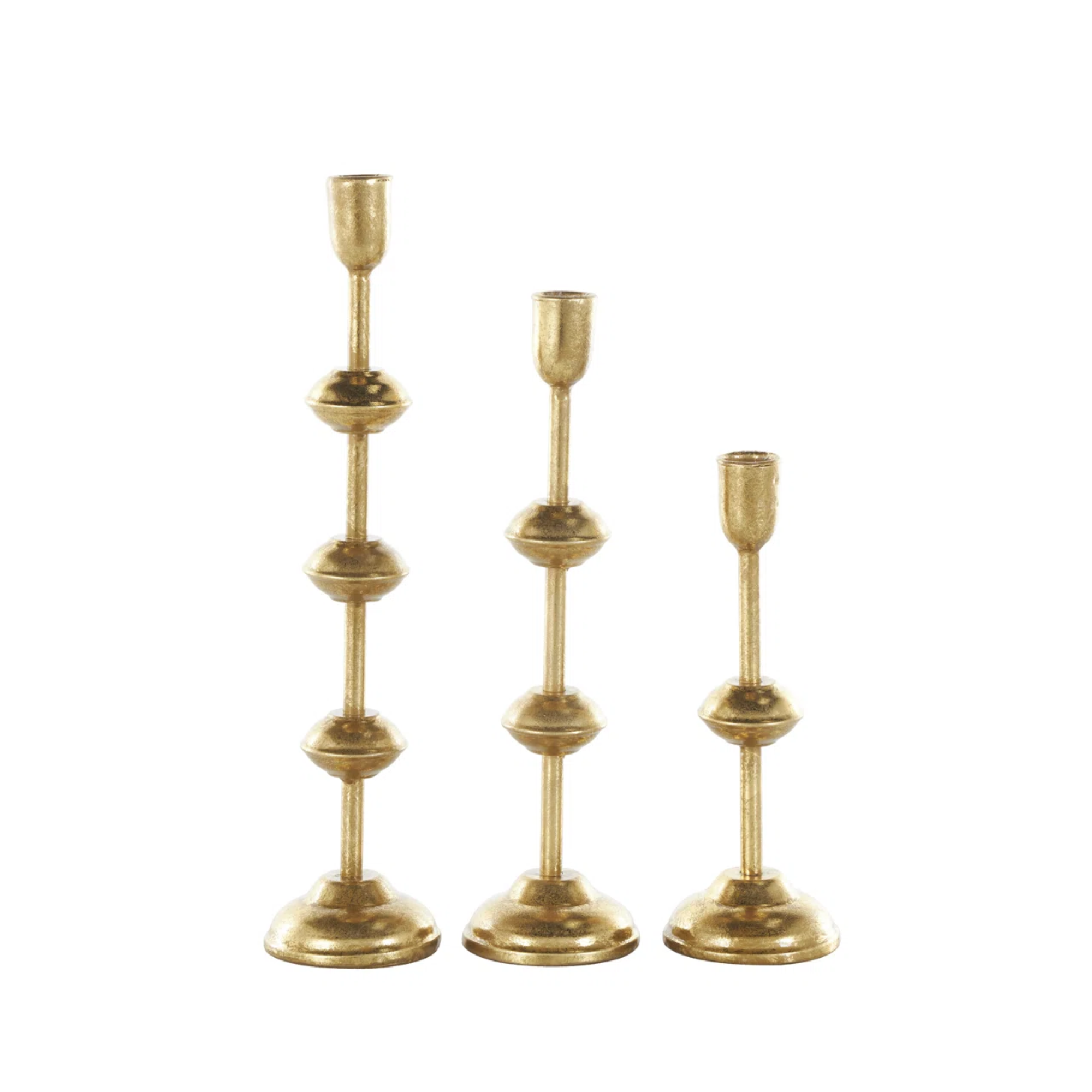 set of three gold candle holders