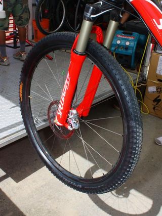 Specialized factory team riders were spotted in the pits with new carbon-rimmed wheelsets.