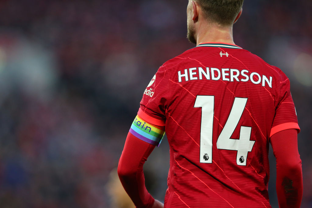 Jordan Henderson of Liverpool wears a rainbow captains armband as clubs show their support to the Stonewall Rainbow Laces campaign during the Premier League match between Liverpool and Southampton at Anfield on November 27, 2021 in Liverpool, England.