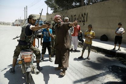 Civilians seeking safety in Manbij