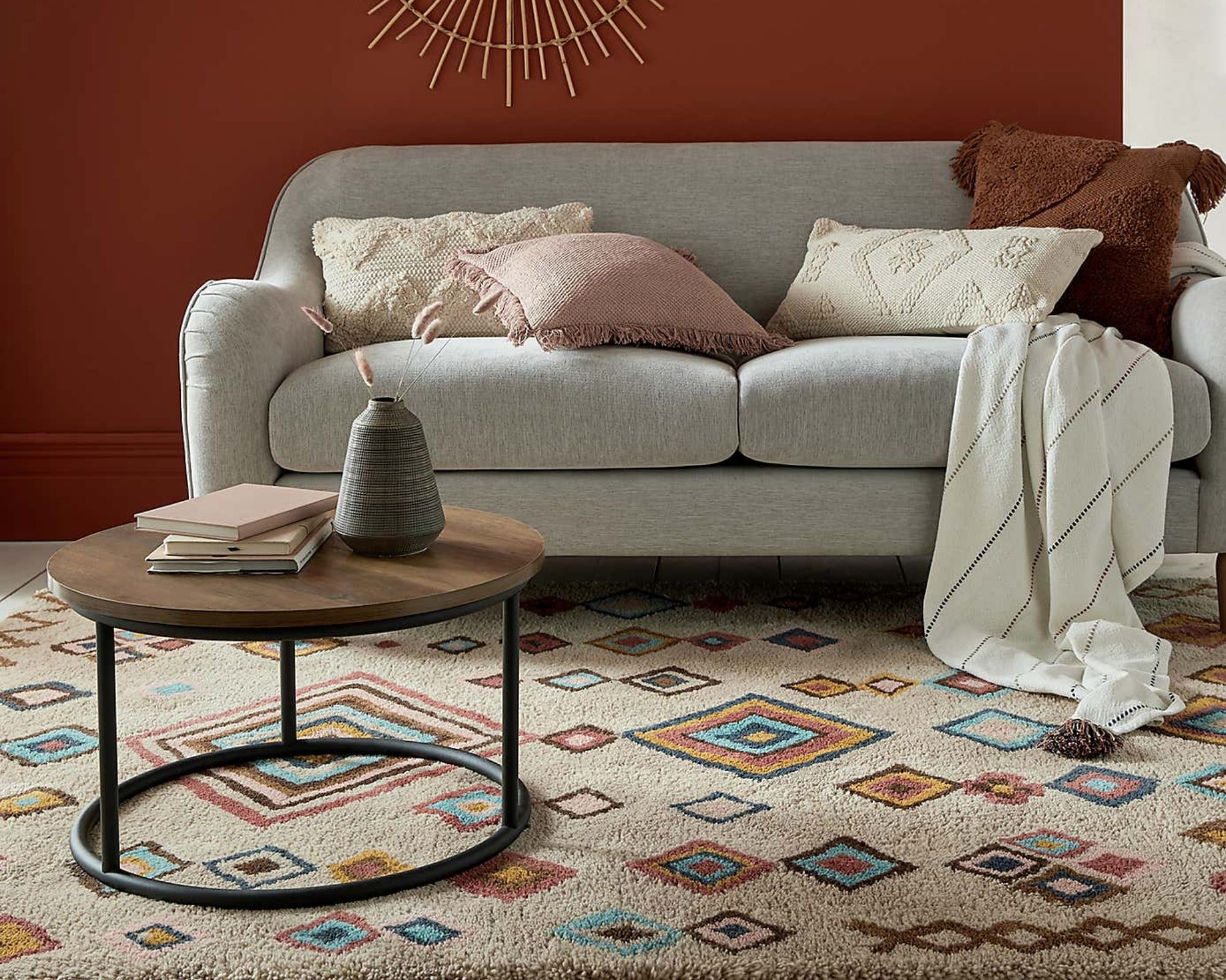Dunelm Berber-style rug in red living room with grey sofa and dark wood/metal coffee table