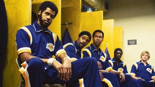 Solomon Hughes, DeVaughn Nixon and Jimel Atkins as Kareem Abdul-Jabbar, Norman Nixon and Jamaal Wilkes sitting in Lakers lockerrom in Winning Time