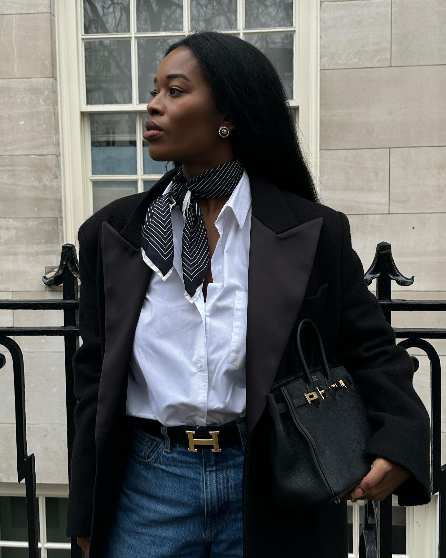 An image of @nlmarilyn with a scarf neck tie, one of the most stylish ways to wear a scarf in 2025.