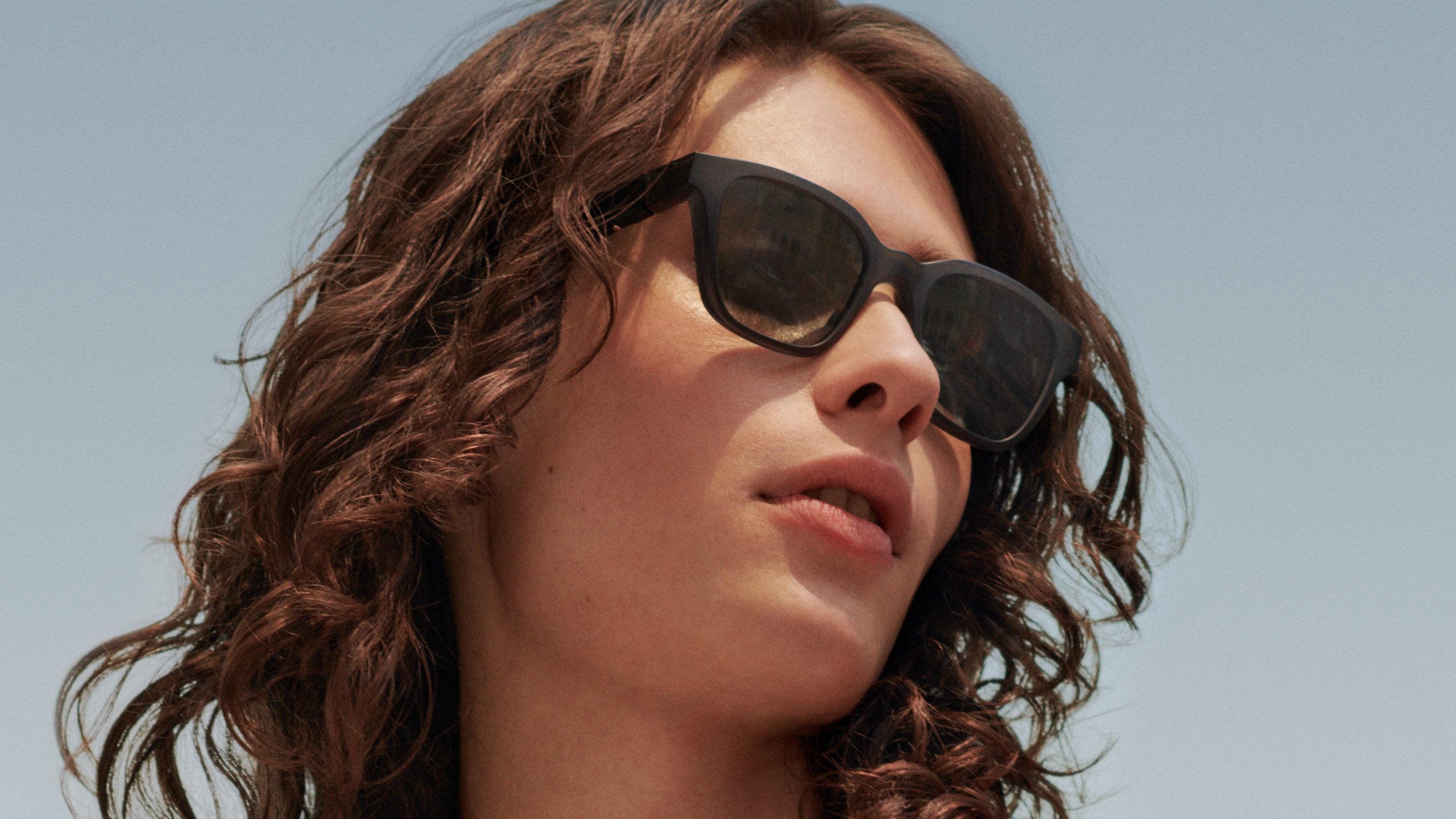 Woman wearing Bose Frames