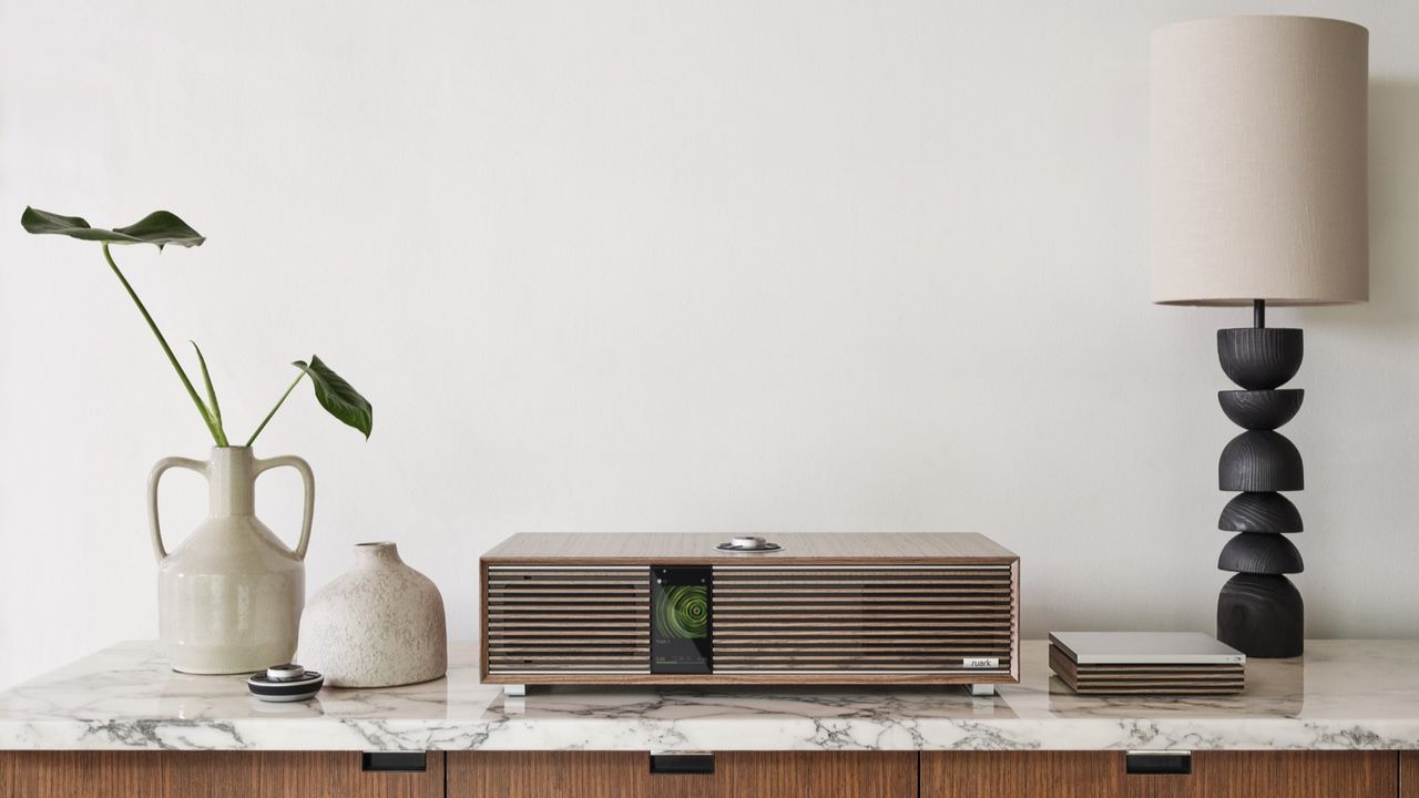 The Ruark Audio R-CD100 CD player next to another 100 Series device