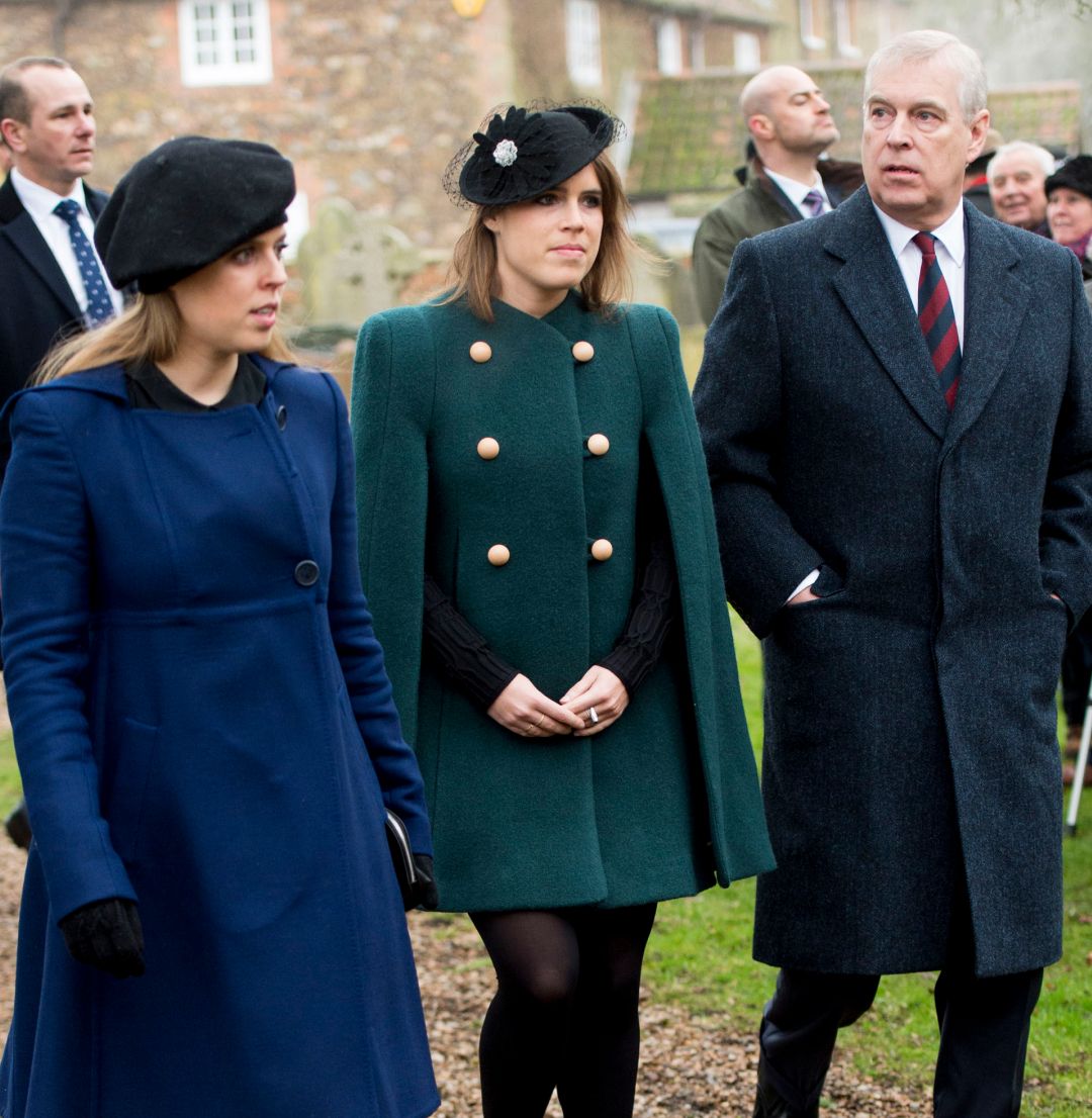 Andrew Mountbatten-Windsor, Princess Eugenie and Pricness Beatrice wearing coats walking to church in 2018