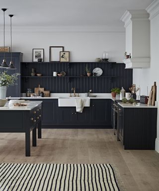 Monochrome kitchen with rug