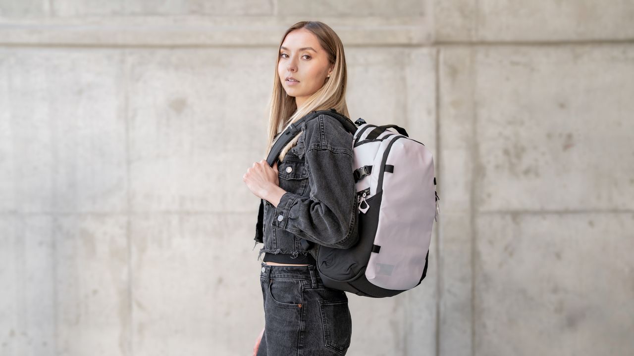 The Wandrd Stratus camera backpack worn by a person