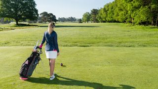 PGA pro Jo Taylor visualising a tee shot on the opening hole of a golf course