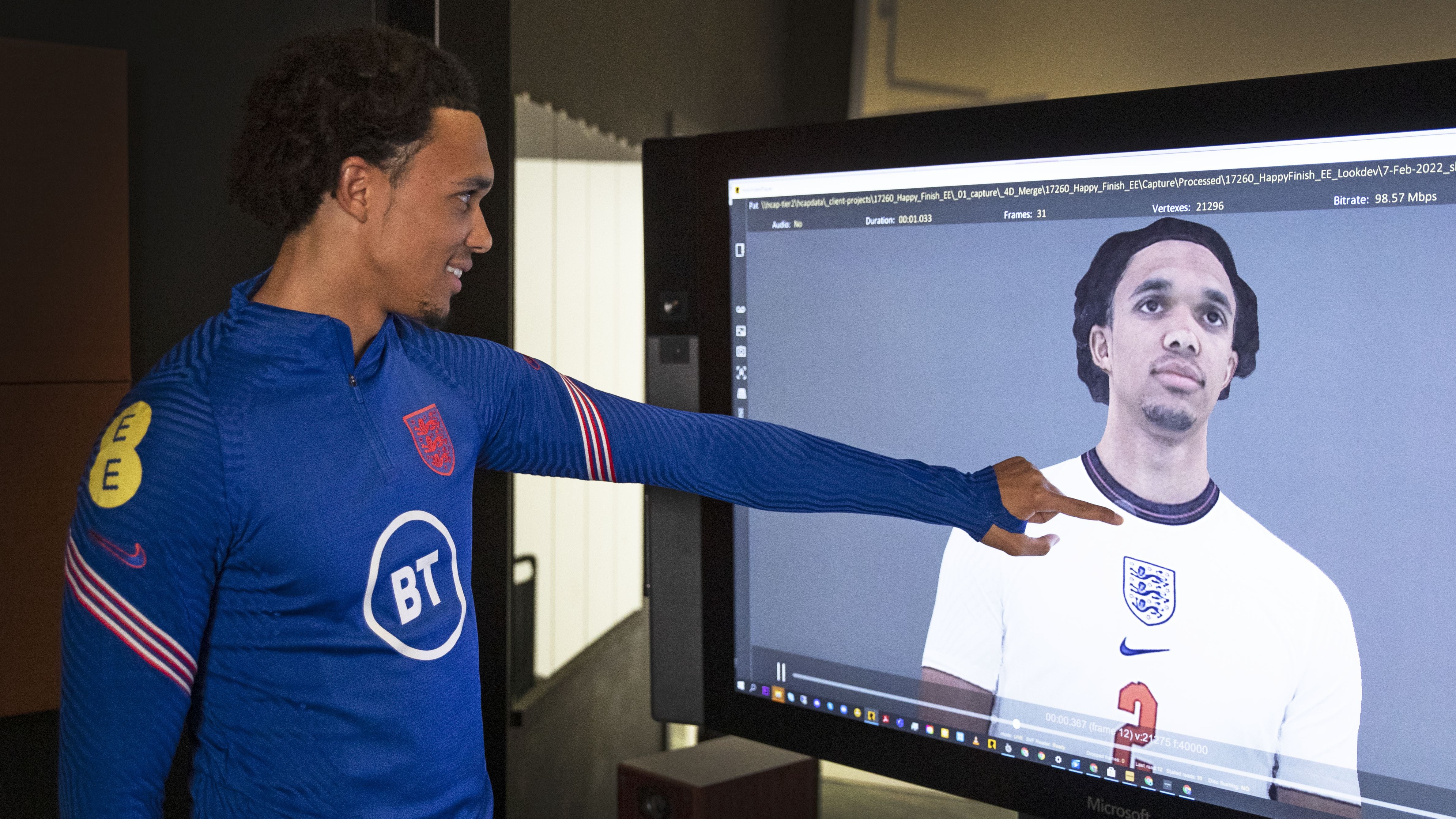Trent Alexander-Arnold admiring a virtual recreation of himself