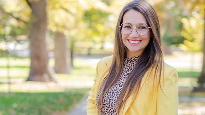 photo of smiling woman outdoors