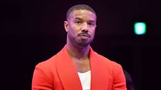 "I Am Legend 2" star Michael B. Jordan in a red blazer at the 2023 Japan Premiere of "Creed III".