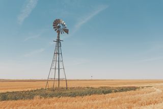 Texas landscape with a tall windmill