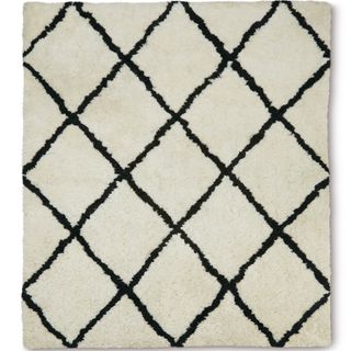 white and black Aldi berber rug